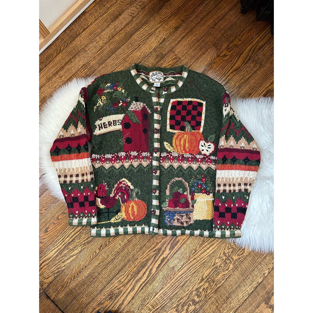 Festive Green Sweater with Holiday Patterns